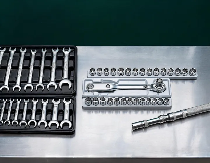 Gearwrench hand tool catalog on a workbench